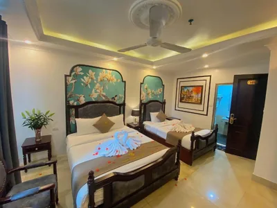 带阳台家庭套房 — Nam Cường X Hotel